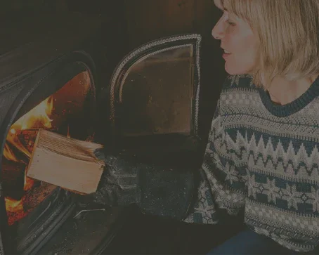 Flames burning inside a wood-burning stove